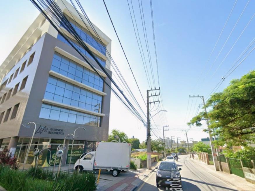 Foto ilustrativa 25 - São José/SC – Roçado – Sala com 60m²