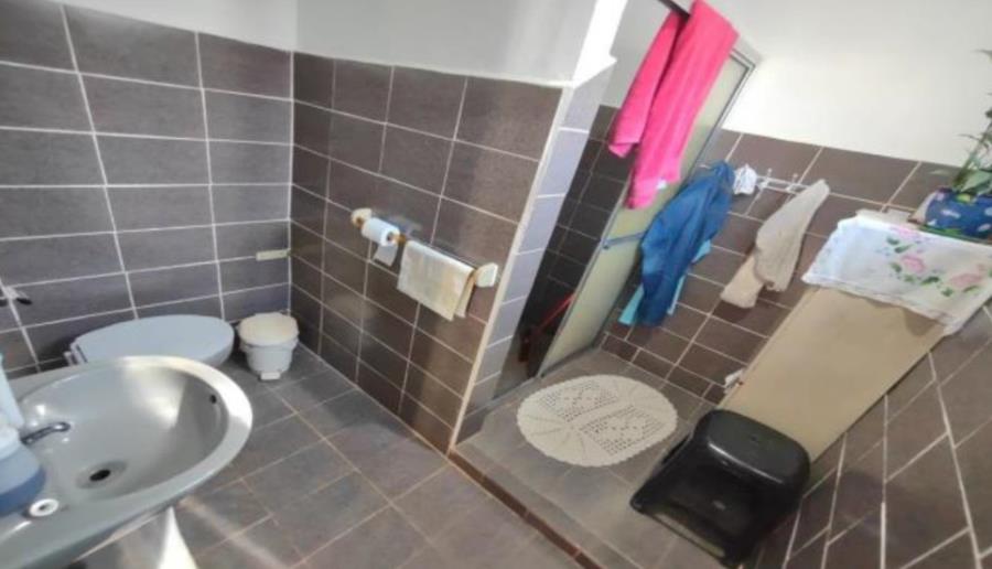 Porto Ferreira/SP - Jardim Alto da Serrra D'Água - Casa com 200m² Leilão Banco Inter, localizado em Porto Ferreira - SP, bairro Jardim Alto da Serra D'água